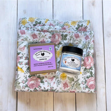 Load image into Gallery viewer, Floral fabric blanket with a jar and soap on a wooden surface