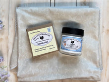 Load image into Gallery viewer, Bar of soap and jar of baby bum cream on a baby blanket with natural wood