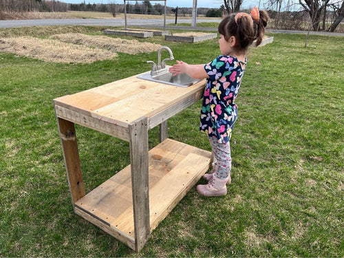 Children outdoor sink station made from recycled materials does include new bar sink and faucet. Perfect height for ages 2 to 9 years old.  Hooks up to outside hose with an adapter, not included. 