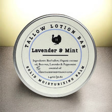 Load image into Gallery viewer, Tallow lotion bar with lavender and mint scent on a neutral background
