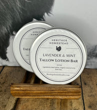Load image into Gallery viewer, natural tallow lotion bars in a travel tin, that glide on with your body heat for effortless application. Packed with nourishing nutrients and moisture, these lotion bars are the perfect size for tossing in your bag when you&#39;re on the go 1.3 oz
