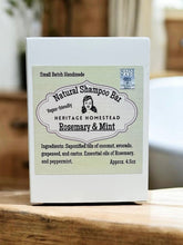 Load image into Gallery viewer, Natural shampoo bar packaging with a label on a wooden surface
