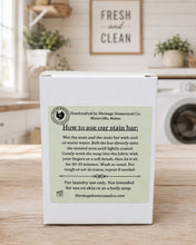 Load image into Gallery viewer, A white cardboard box for Heritage Homestead Co. stain bar, shown from the back with a printed instruction label.
